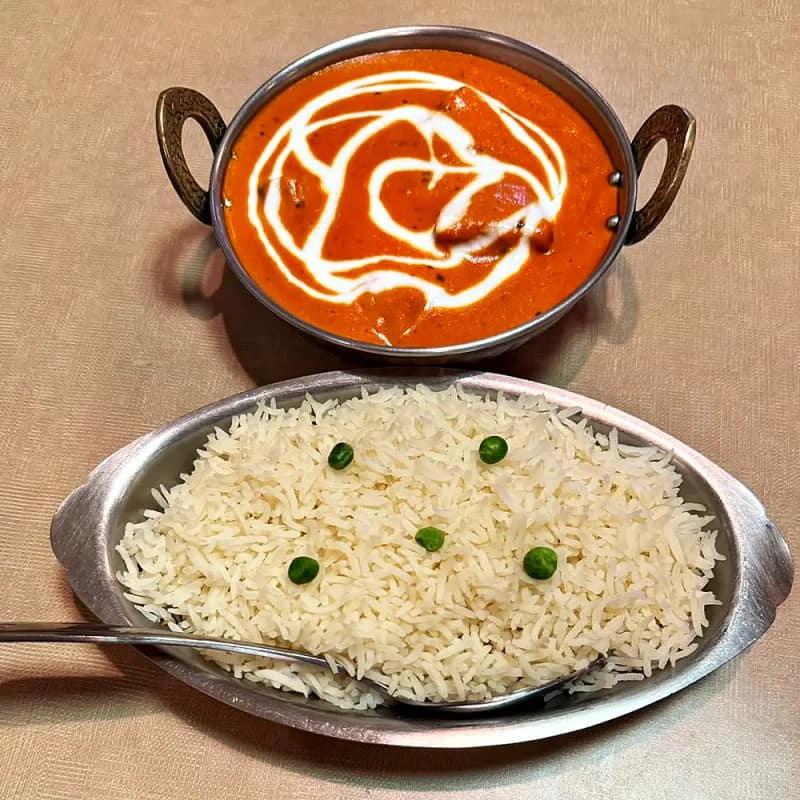 Butter Chicken — chicken simmered in a creamy tomato sauce
