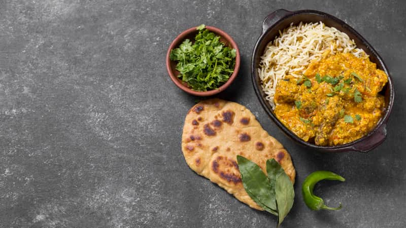 A spread of Indian curries, bread, and rice at Little India Restaurant